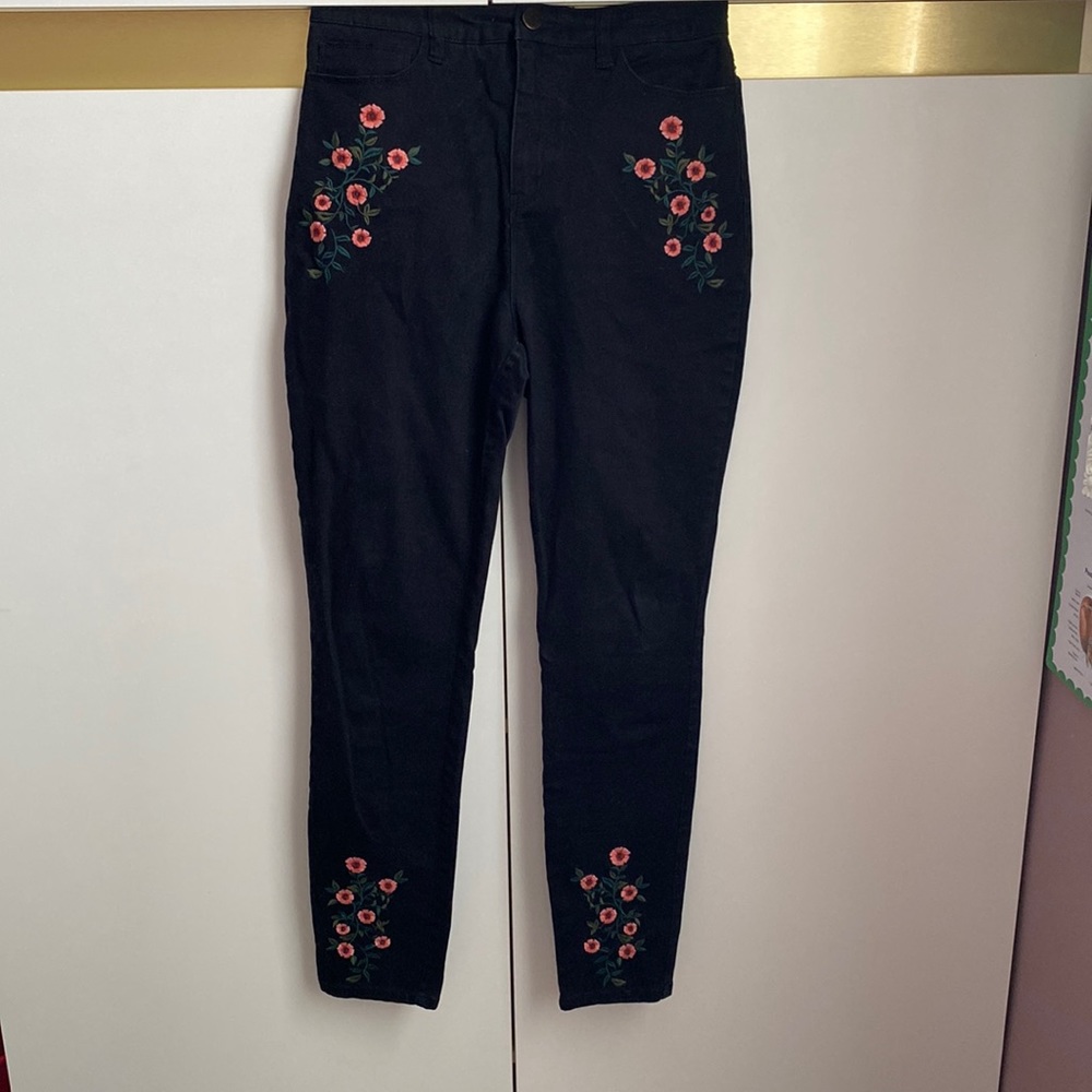 Black Velour pants with flower stitchings, from Twik (exclusively at Simon’s)